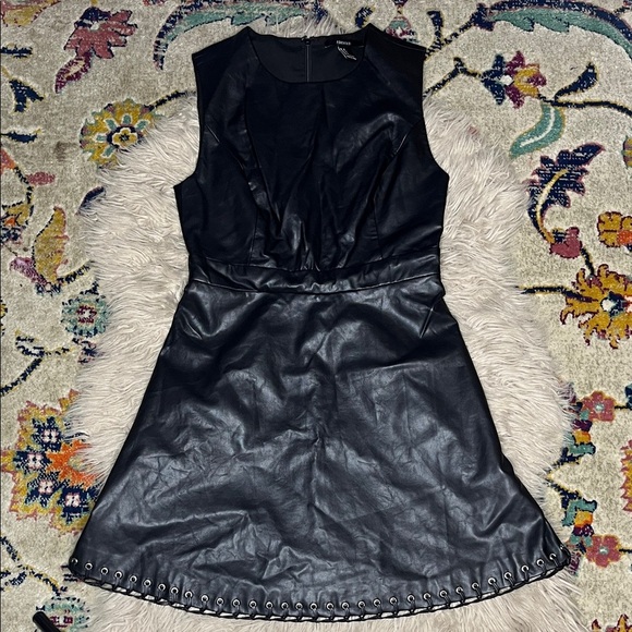 Forever 21 Dresses & Skirts - Forever 21 Black Faux Leather Mini Dress with Eyelet Hem
